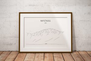 Haystacks line art print in a picture frame